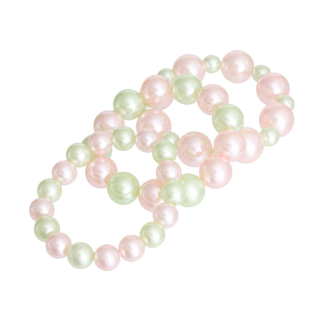 Pink green pearl stretch bracelet set worn on wrist stacked casual
