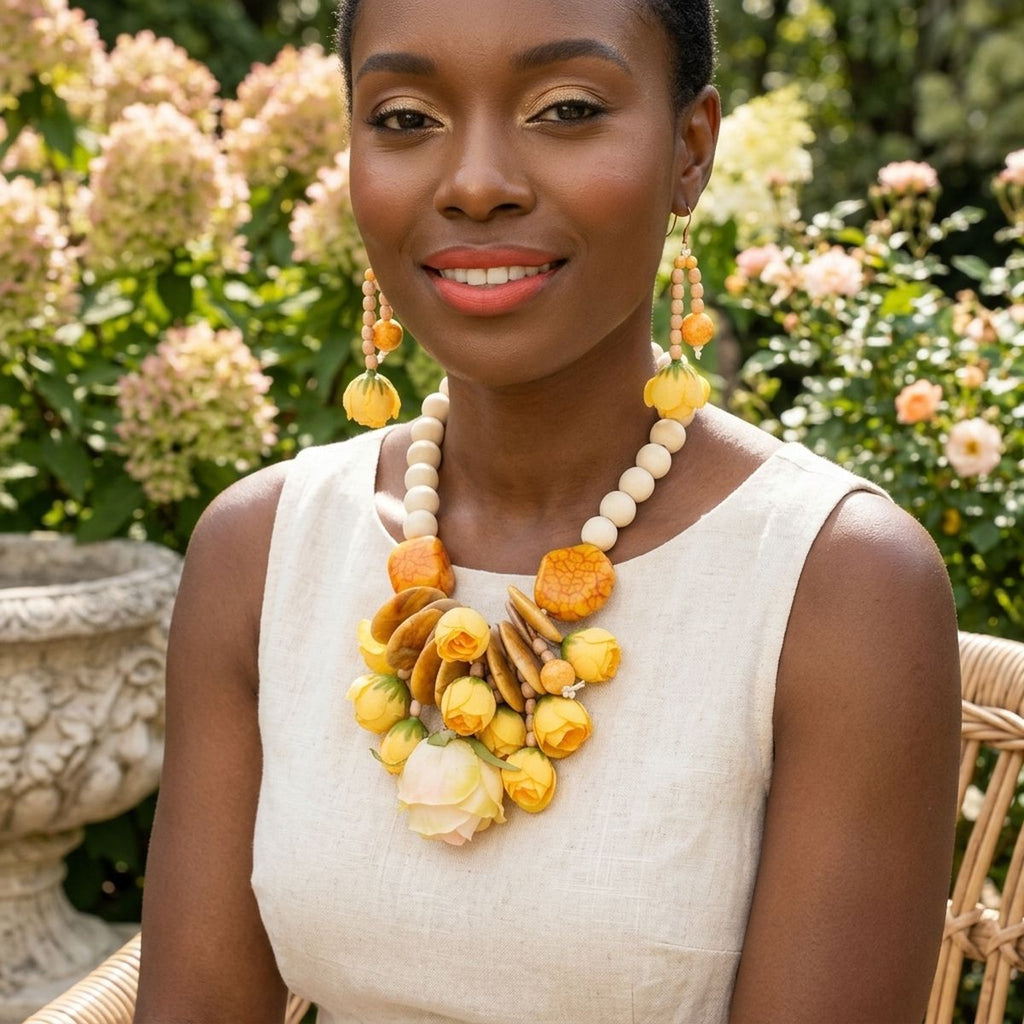 Yellow Hawaiian flower garden bib necklace worn on neck view