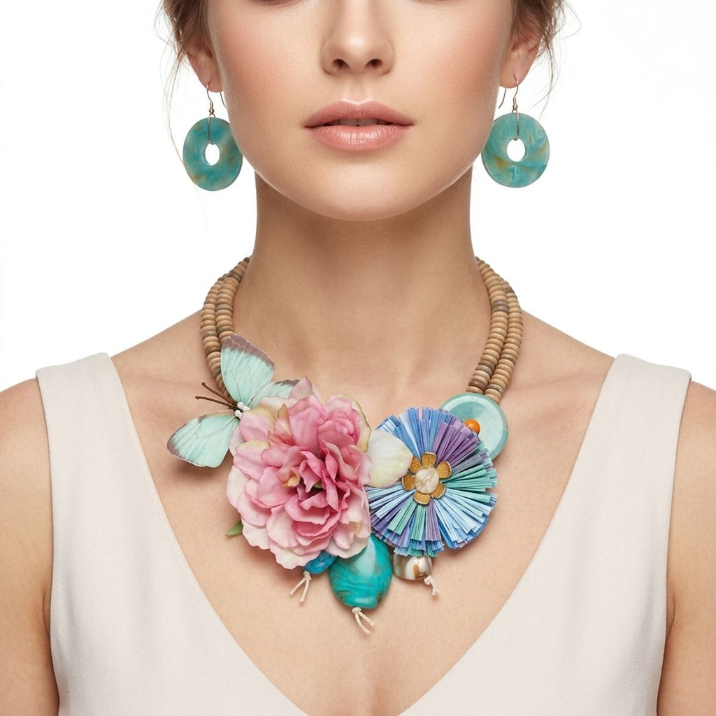 Seaside butterfly garden bead bib necklace worn on neck close up view