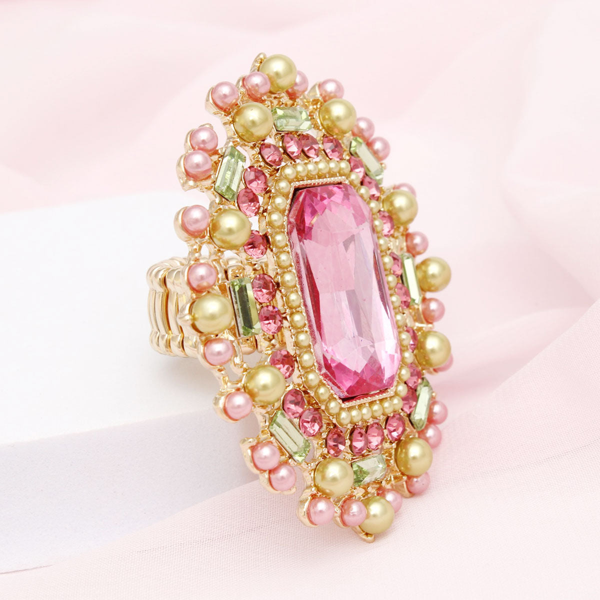 Pink green pearl cocktail ring crystal center detail close up view