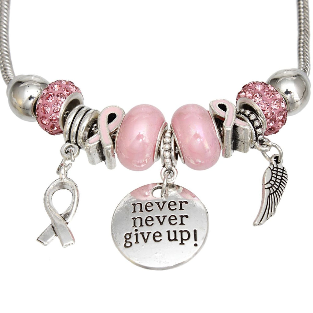 Never give up breast cancer silver charm bracelet on wrist