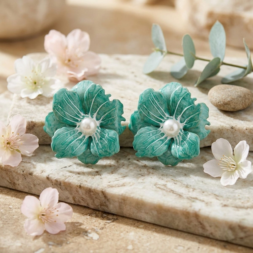 Green flower stud earrings swirled enamel petal detail close up