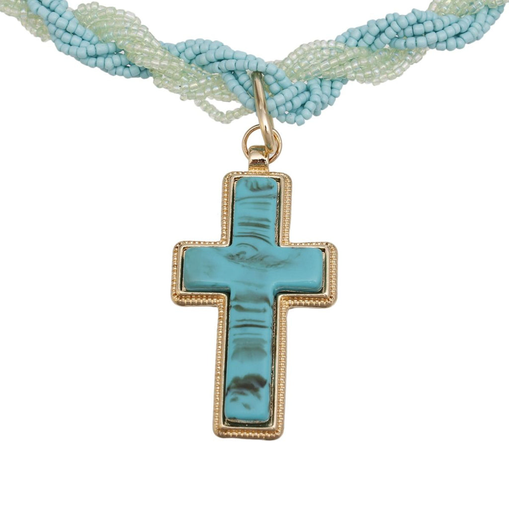 Turquoise twisted bead cross necklace marbled cross pendant detail close up