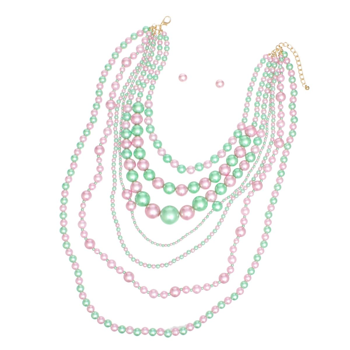 Pink green 7 strand pearl necklace worn on neck layered view front