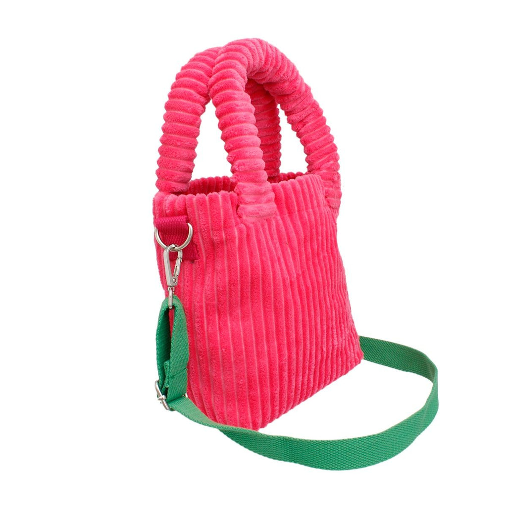 Pink corduroy tote green strap detail close up texture