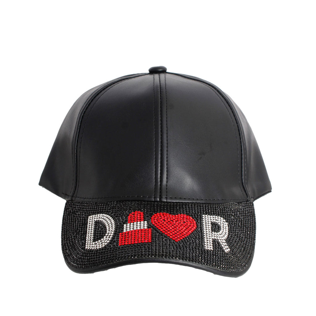 Black designer D visor cap rhinestone D logo detail close up leather