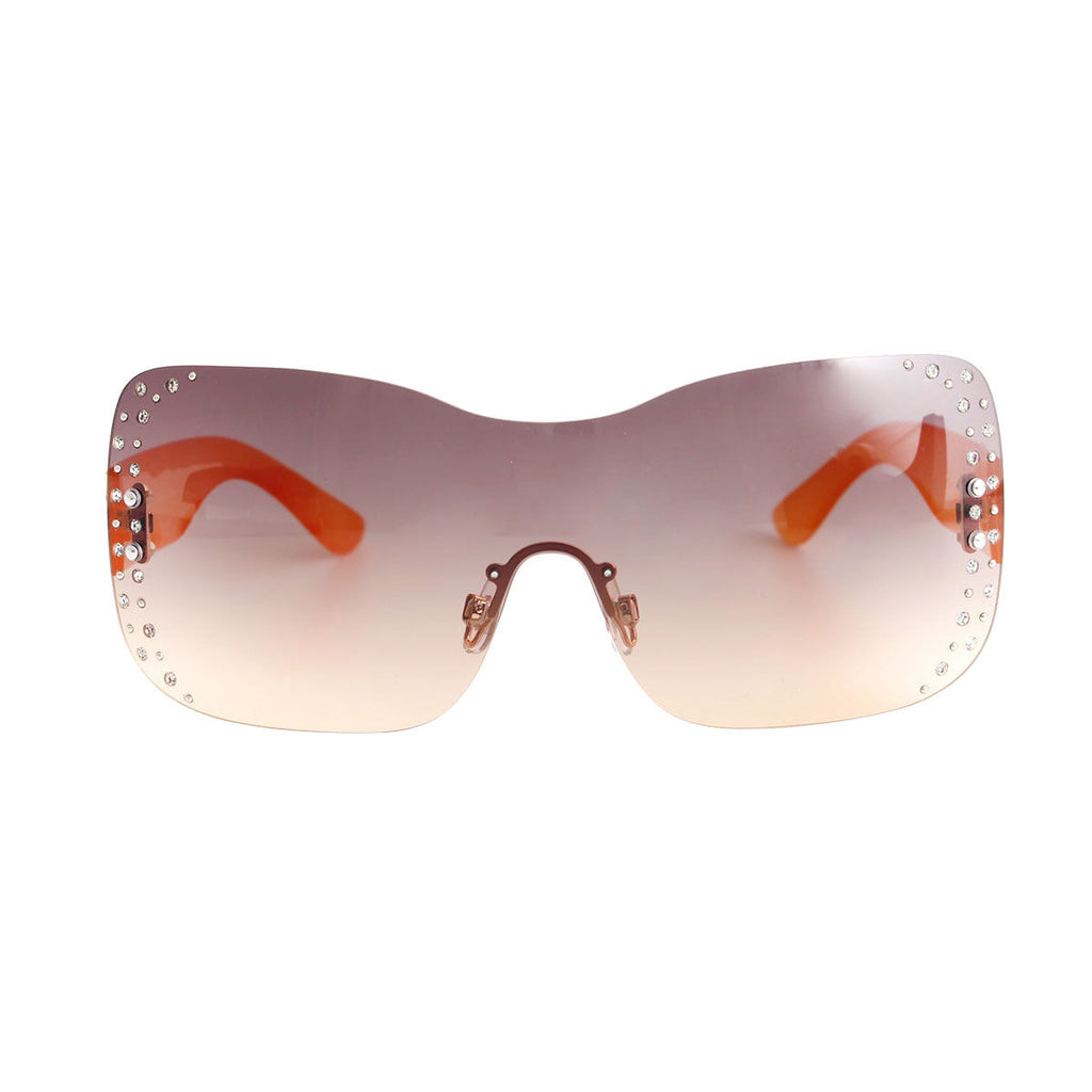 Orange rimless butterfly shield sunglasses side rhinestone lens view